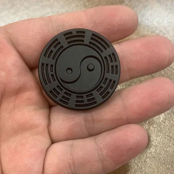 Design: Haptic Coin,The haptic coin design provides a satisfying click, enhancing the sensory experience for users.